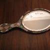 English Victorian mother of pearl inlaid oval hand mirror, front