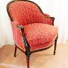An 18th century upholstered Louis XVI Bergère chair
